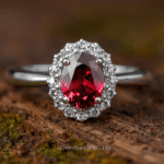 Close-up view of Halo Ring with 3 Carat Oval Garnet set in 925 silver band