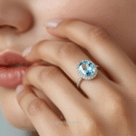 Naturalistic photograph of Blue Topaz Halo Ring on a natural background 🌿 NGJA Certified – Buy Now