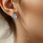 The three stone blue topaz jewelry set presented in a high-end, signature gift box
